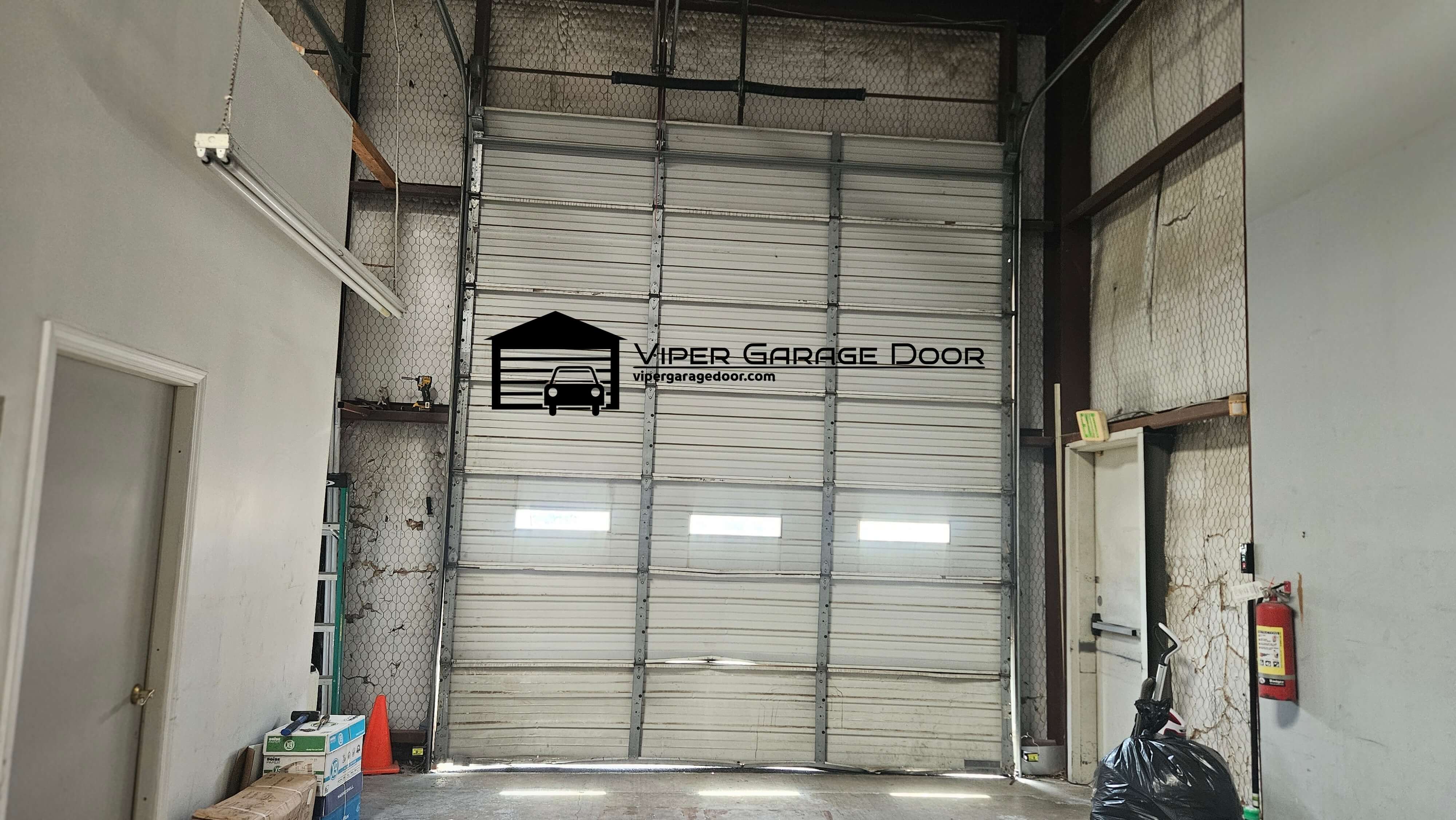 vipergaragedoor.com_commercial_garage_door_spring_replacement