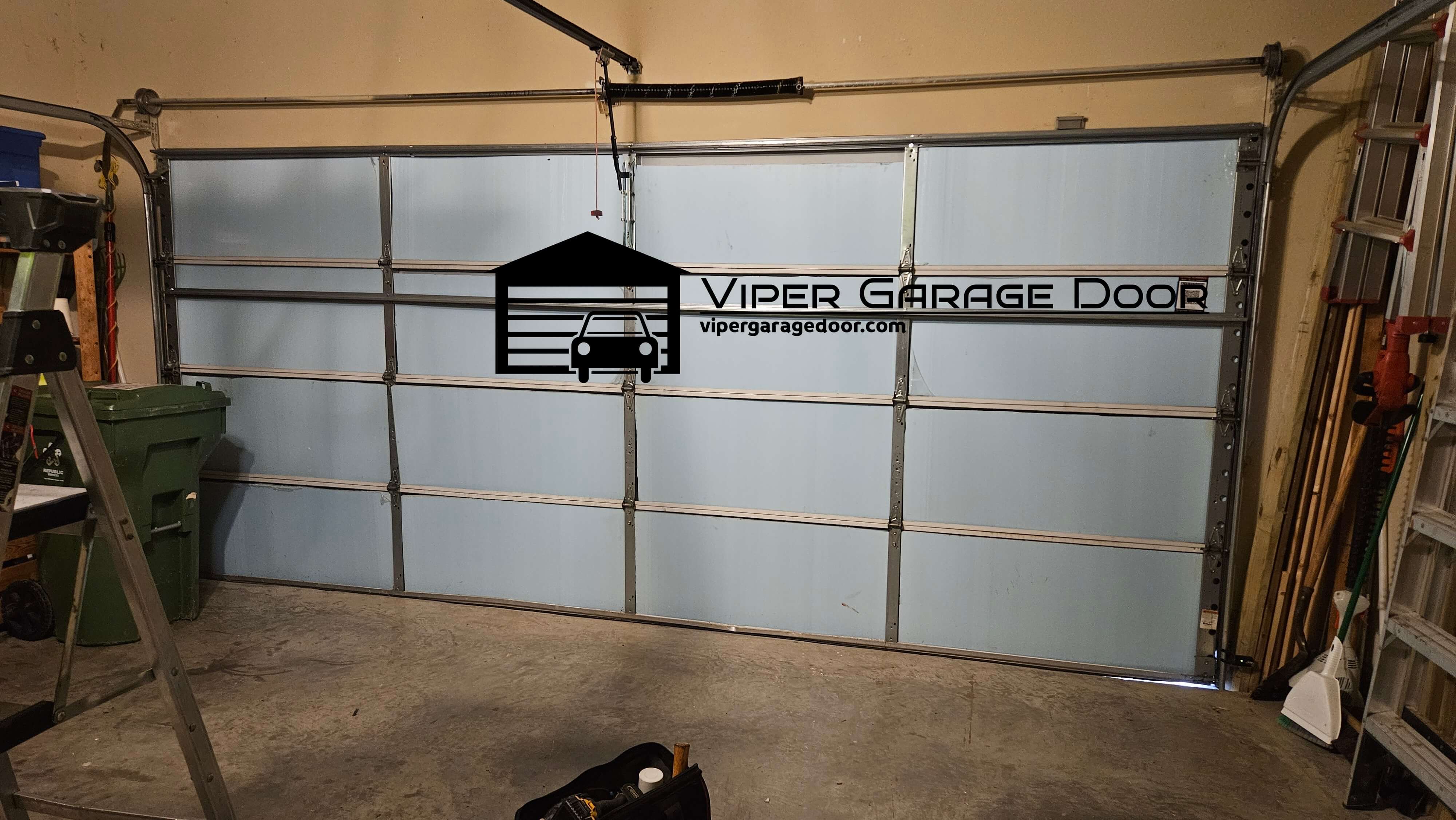 vipergaragedoor.com_garage_door_spring_repair