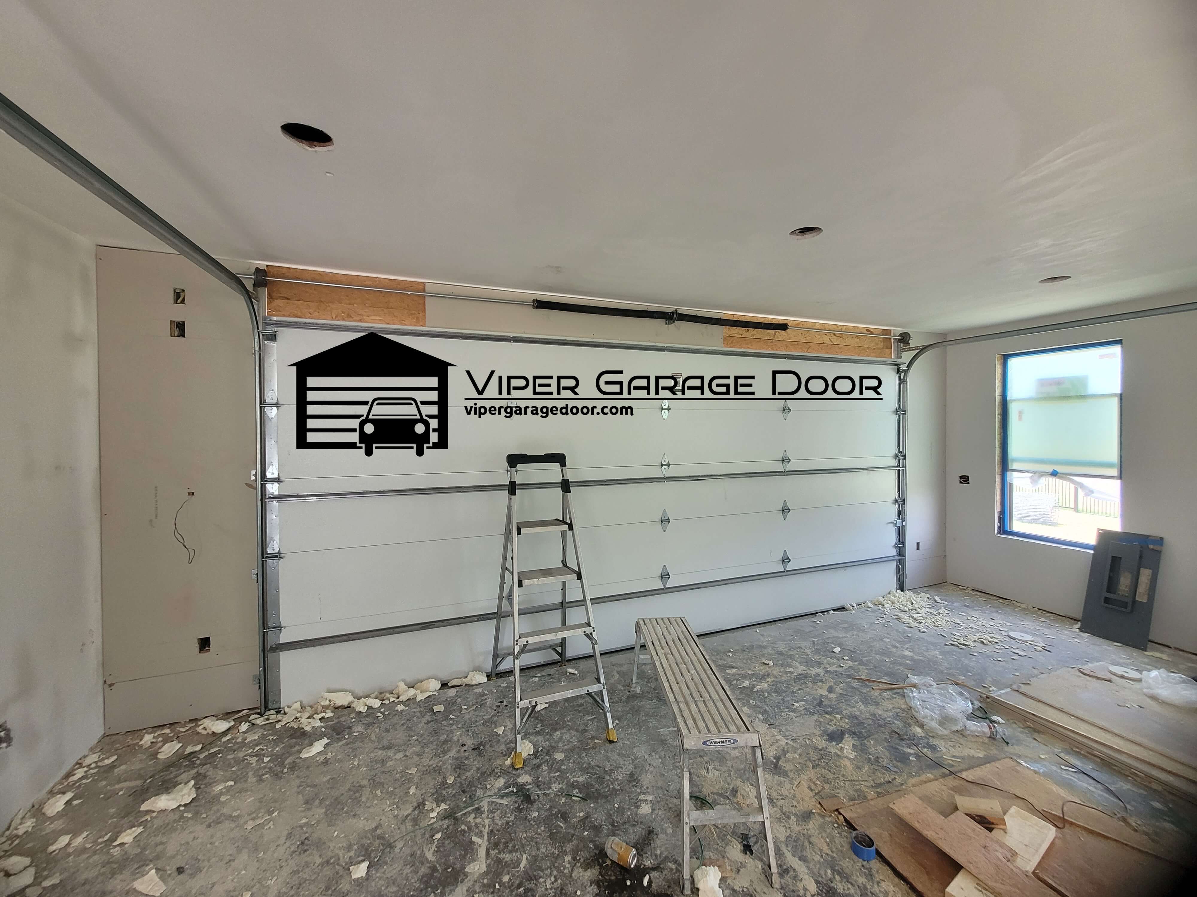 vipergaragedoor.com_garage_door_torsion_spring_replacement